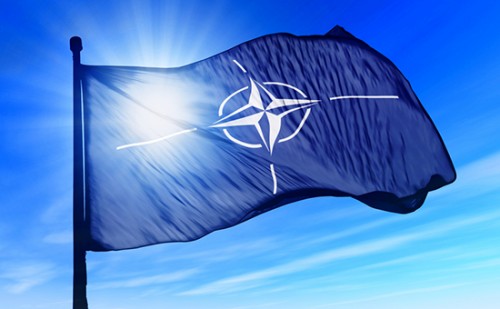 NATO flag waving on the wind