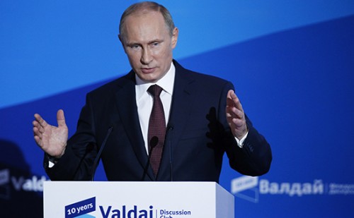 Russian President Vladimir Putin speaks during a meeting with 'Valdai' International Discussion Club members in town of Valdai