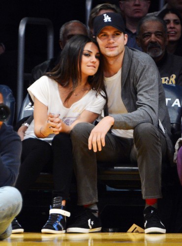 Ashton Kutcher and Mila Kunis watch Lakers play Suns, Los Angeles, CA